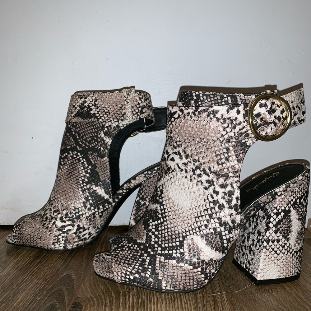 Snakeskin open toe booties